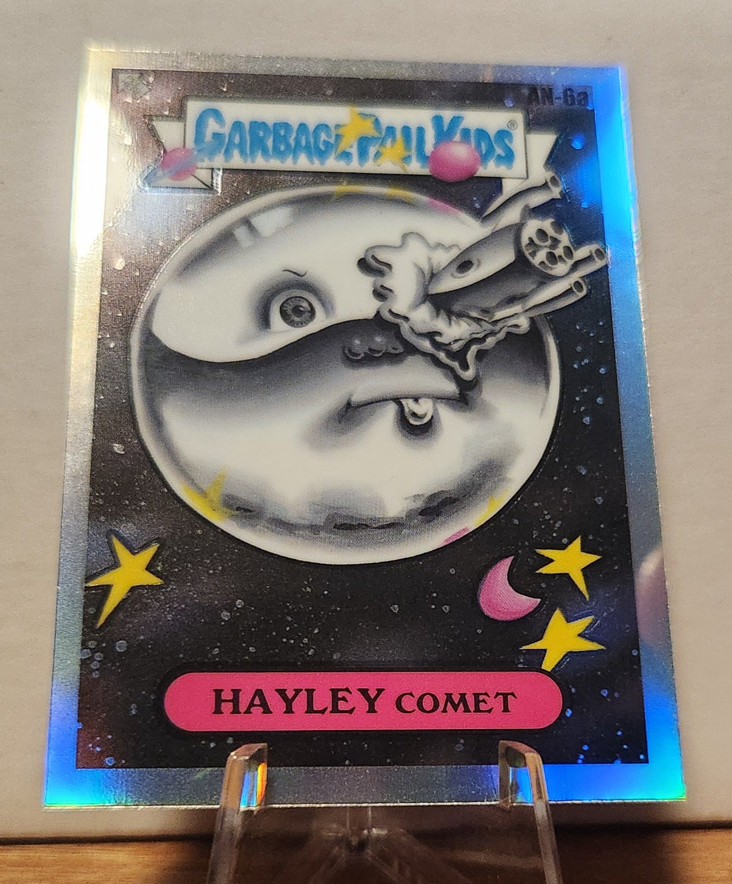 AN-6A HAYLEY COMET- GARBAGE PAIL KIDS-REFRACTOR card featuring a humorous cartoon whale in space
