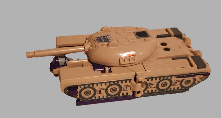 Blitzwing Transformer figure in tank mode with detailed design and movable turret