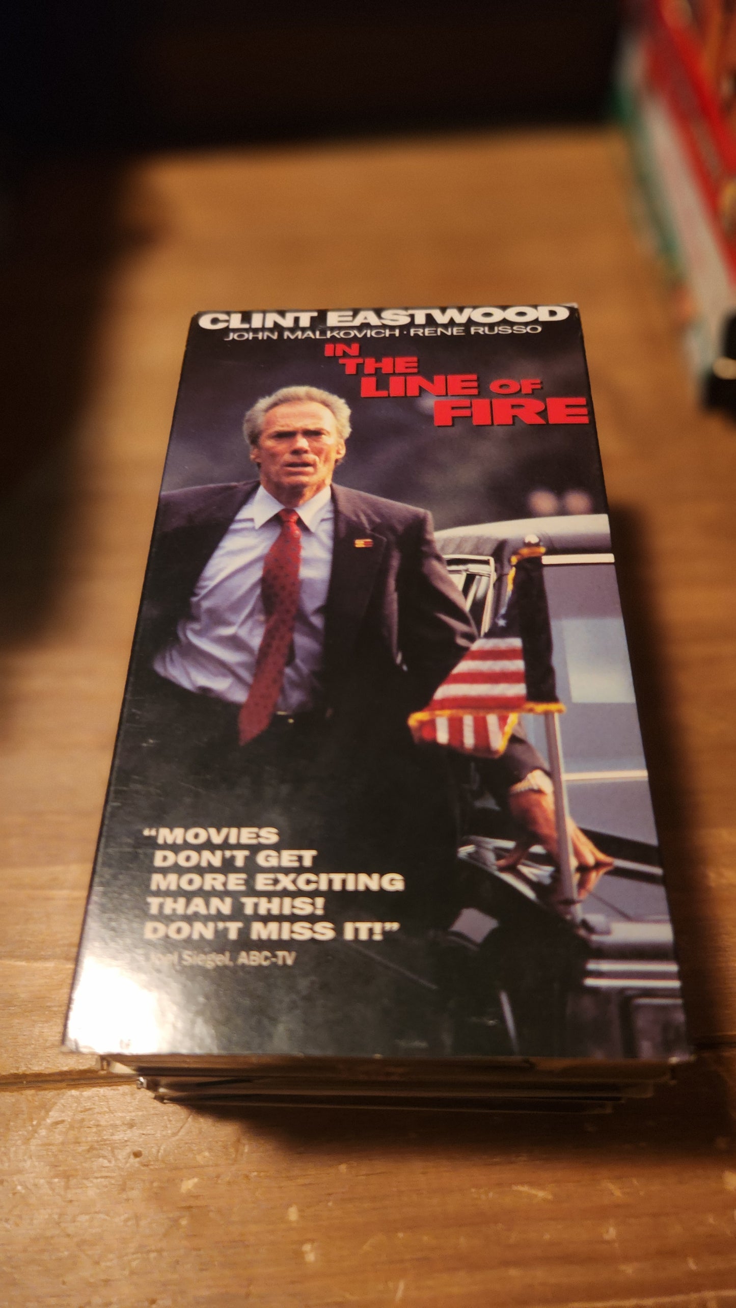 In The Line of Fire VHS tape featuring Clint Eastwood on cover from Lawrence's Collectibles