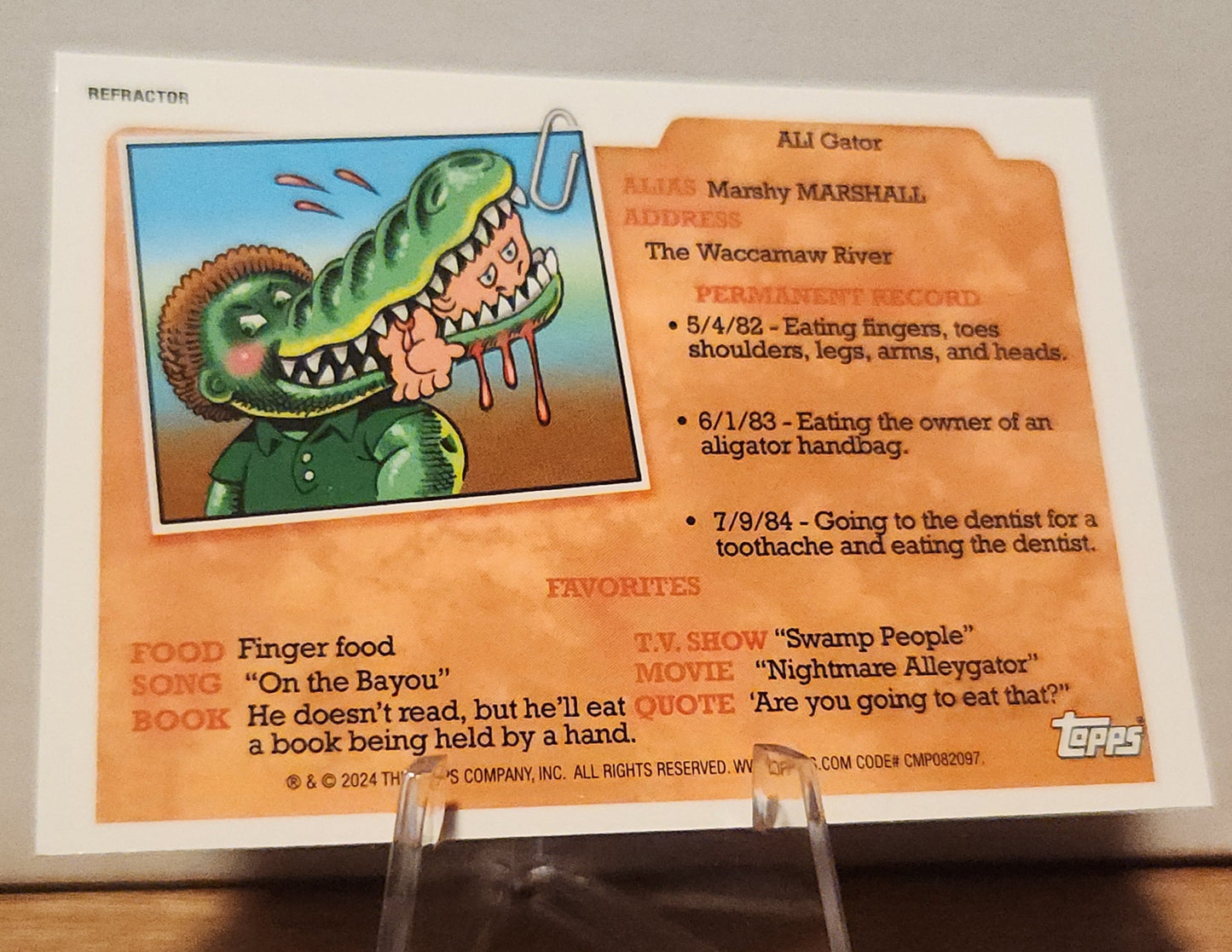 Homer Runt trading card featuring character Ali Gator with fun facts and colorful design from Topps