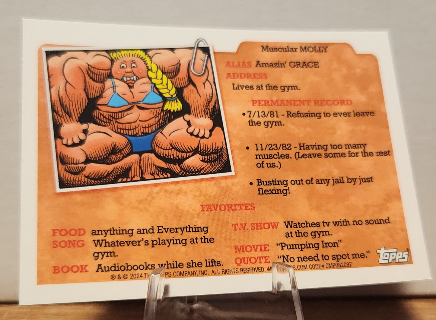 Gladiator Glen Garbage Pail Kids card featuring Muscular Molly with gym-themed details