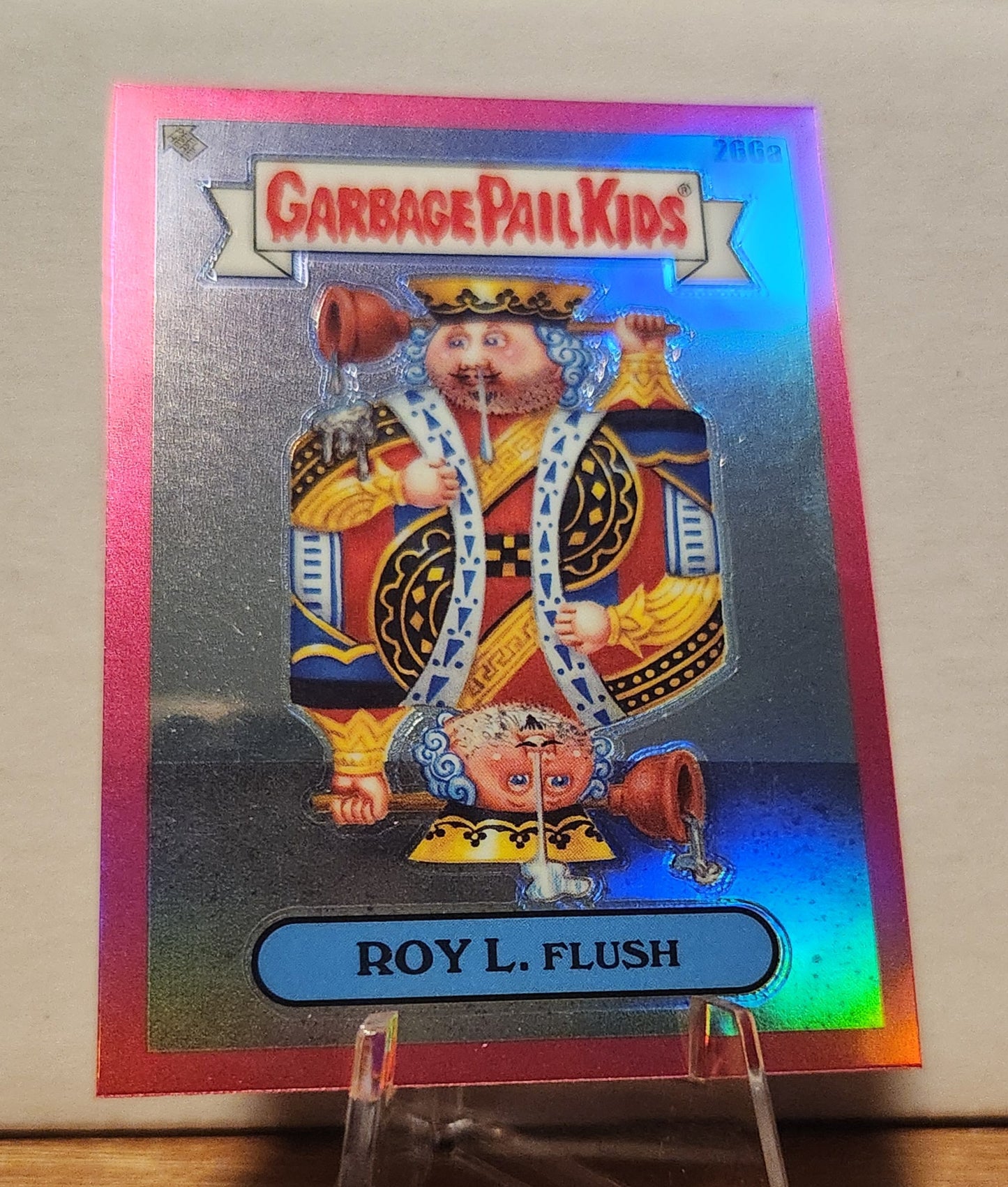 Garbage Pail Kids magenta refractor card featuring Roy L. Flush with shiny holographic finish
