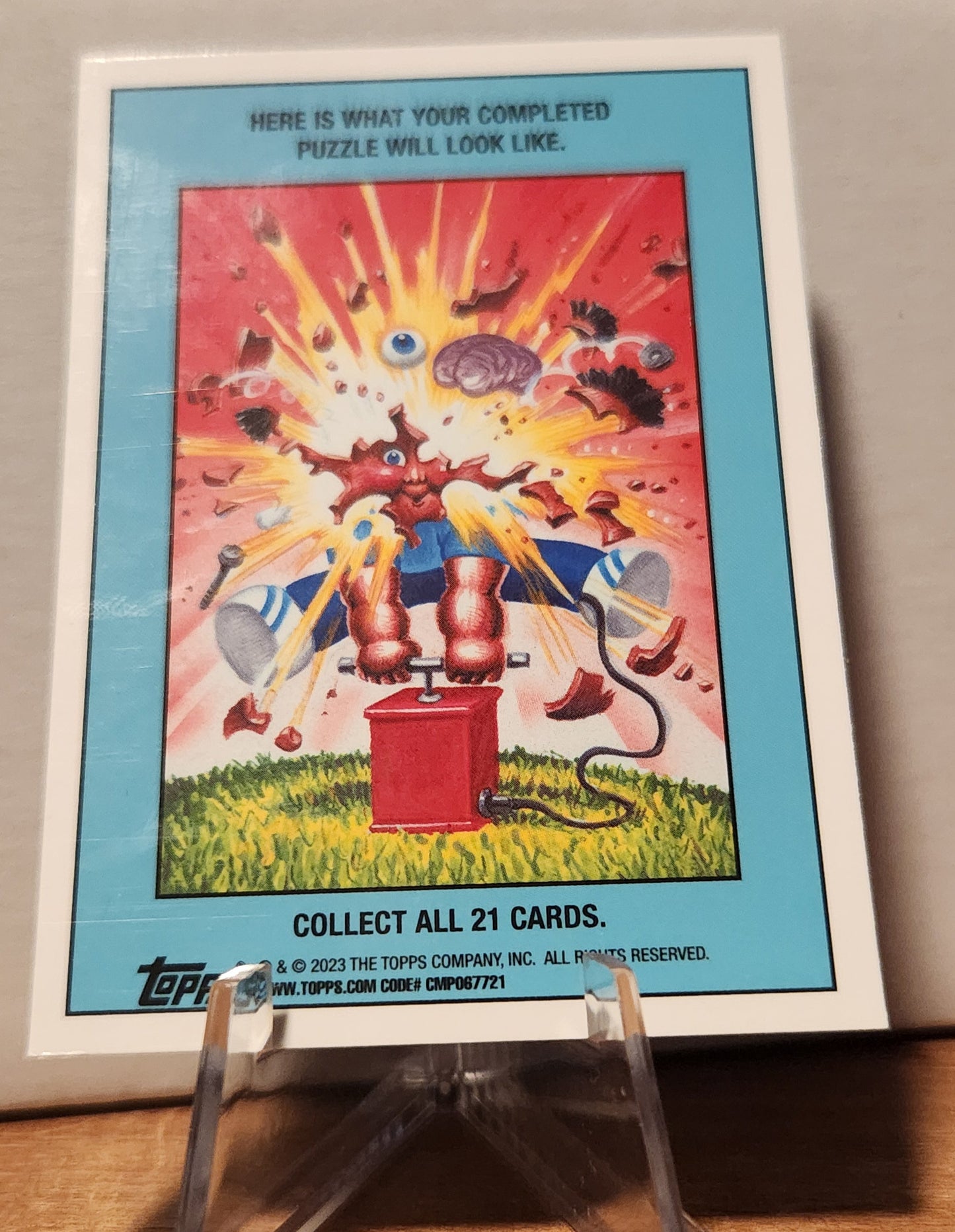 Moist Joyce collectible card featuring a playful explosion scene with colorful cartoon characters