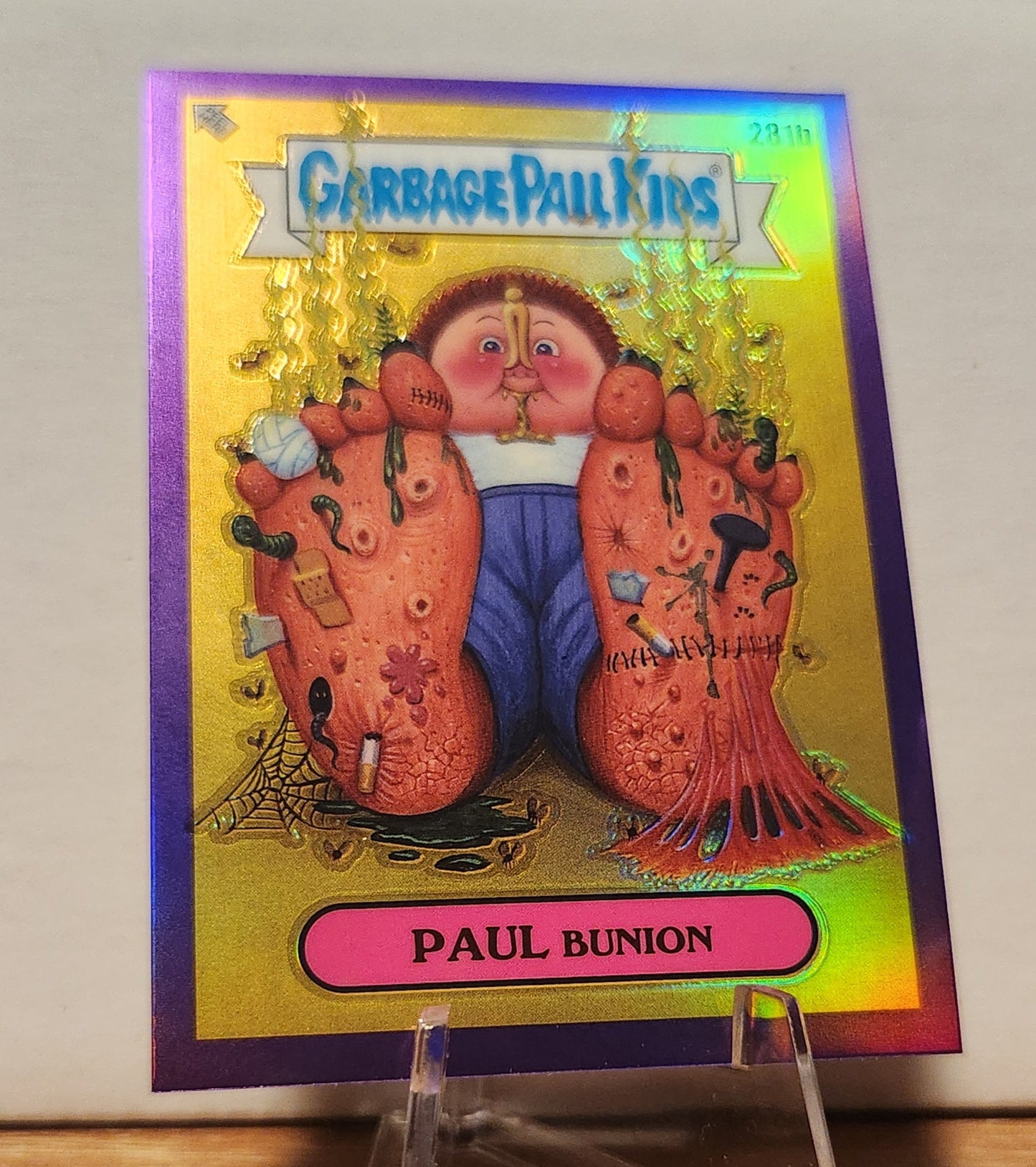 Garbage Pail Kids Paul Bunion Purple Refractor collectible card featuring humorous character design
