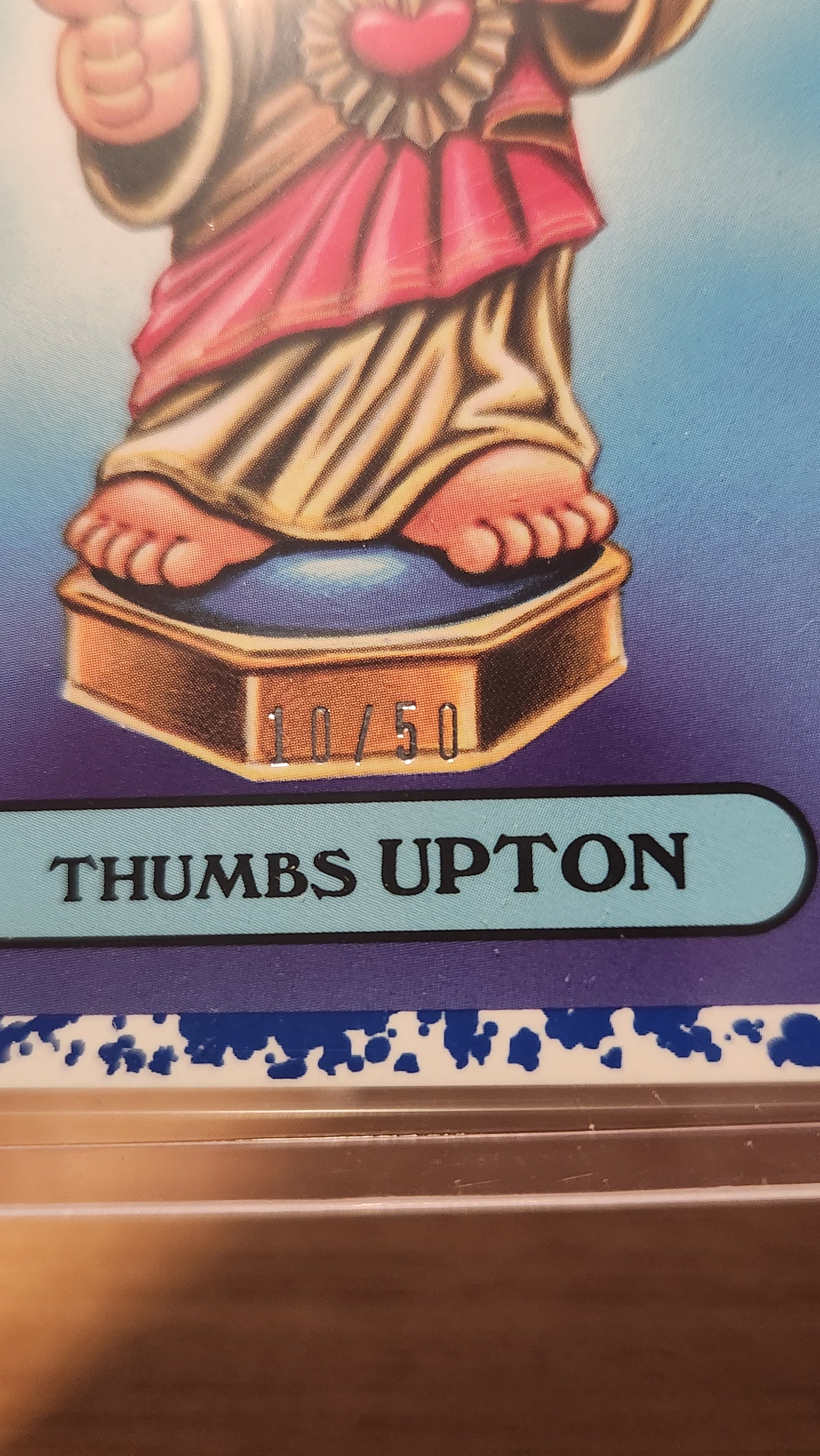 16B THUMBS UPTON - BLUE BORDER 10/50