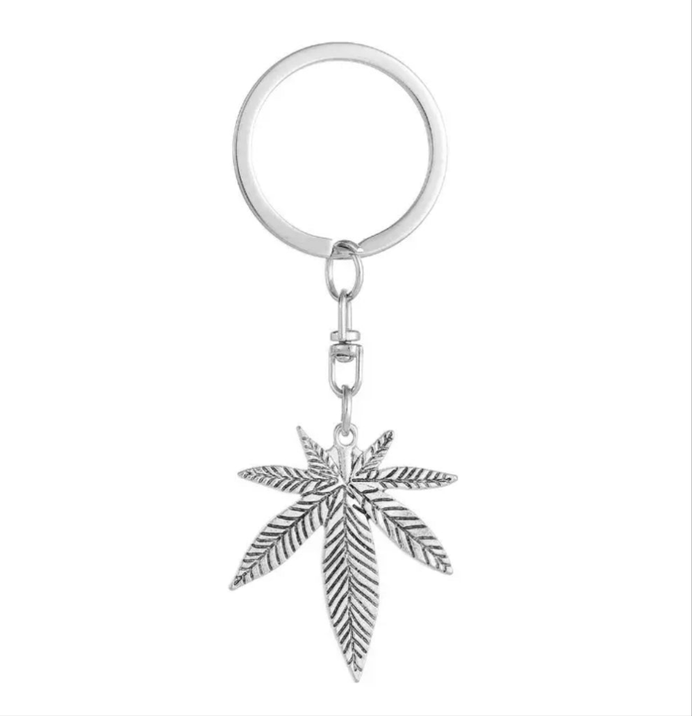 Silver pot leaf keychain with detailed leaf design, perfect for cannabis enthusiasts