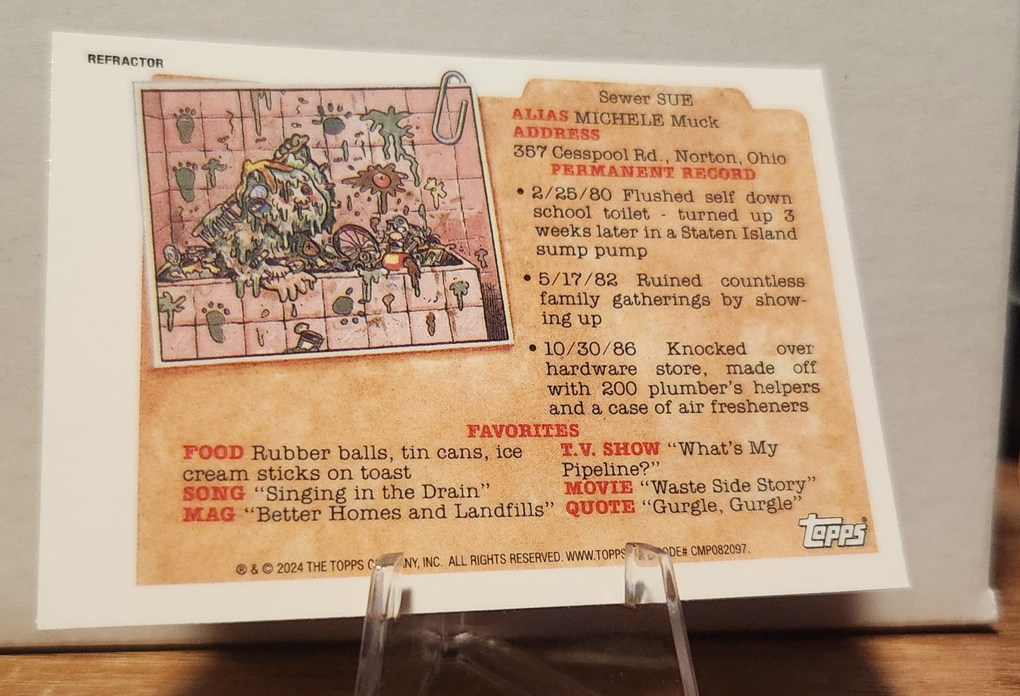 Reptilian Lillian trading card from Topps featuring colorful artwork and character details