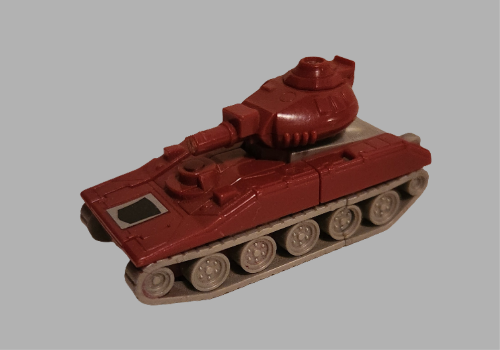 Warpath Transformers collectible figurine shaped like a red tank with detailed design
