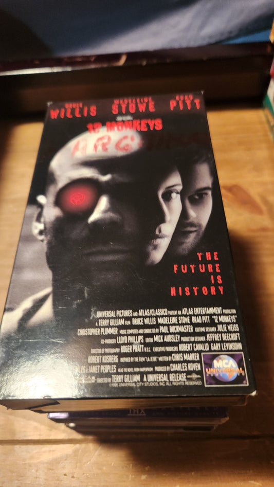Lawrence's Collectibles 12 Monkeys VHS collectible tape with dark futuristic cover art