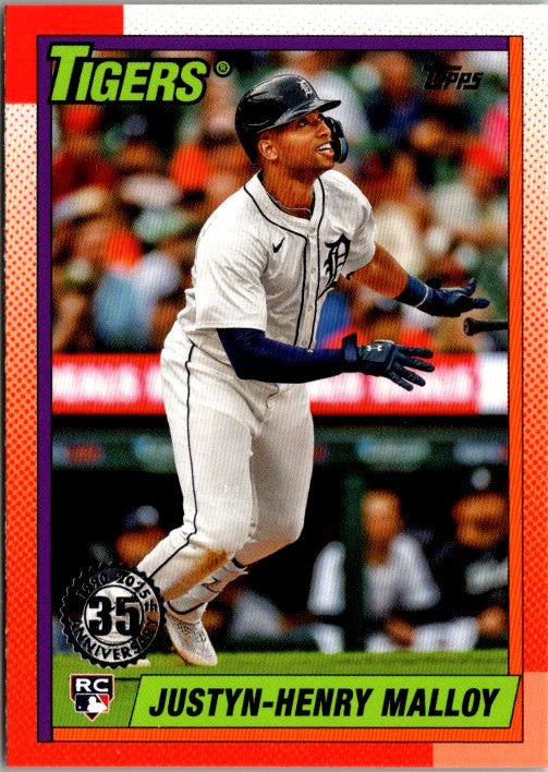 1990 Topps Justyn-Henry Malloy card featuring the player in a Tigers uniform during a game