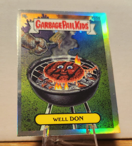 259B WELL DON GARBAGE PAIL KIDS-REFRACTOR card featuring a humorous grilled burger character
