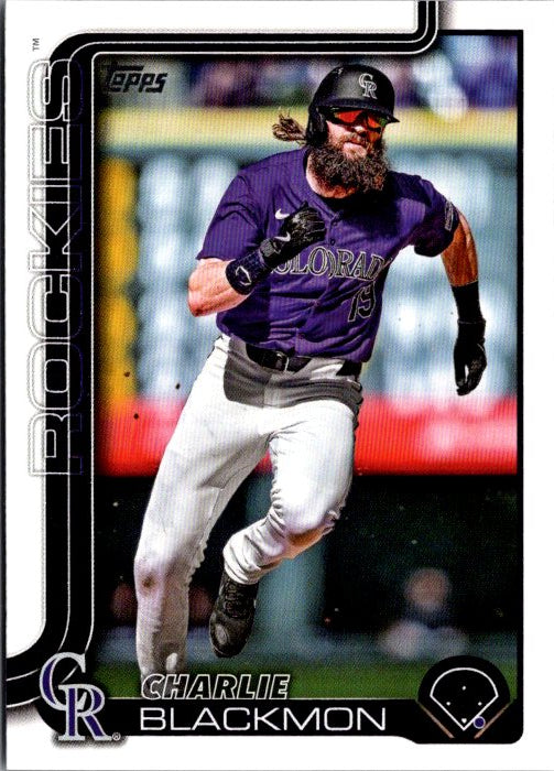 Topps 311 Charlie Blackmon collectibles featuring the player in action for the Colorado Rockies