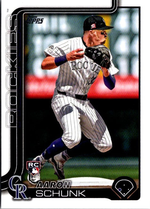 Topps Aaron Schunk rookie card featuring the player in Rockies uniform and action pose