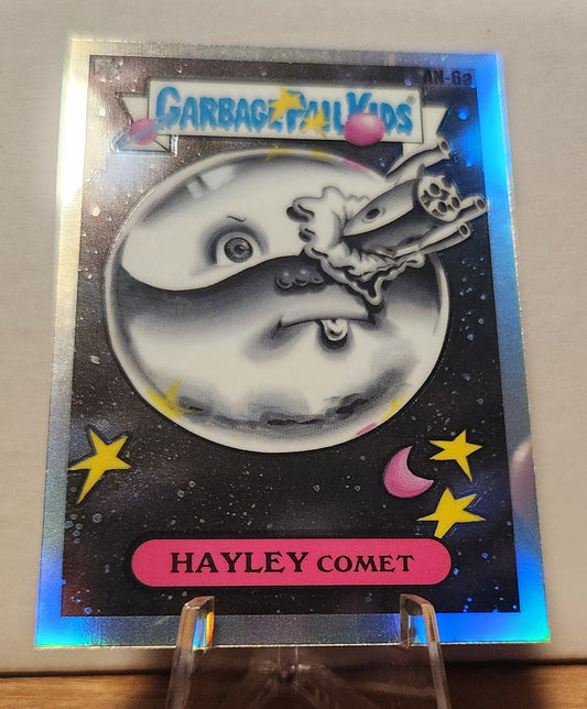 AN-6A HAYLEY COMET- GARBAGE PAIL KIDS-REFRACTOR card featuring a humorous cartoon whale in space