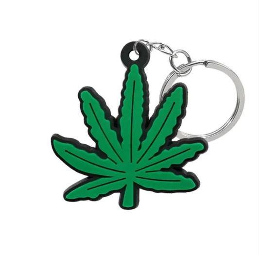 Green cannabis keychain novelty shaped like a cannabis leaf for fun accessory enthusiasts