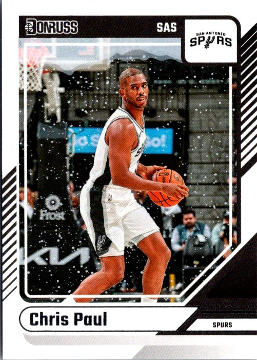 Chris Paul trading card featuring him in a San Antonio Spurs uniform holding a basketball