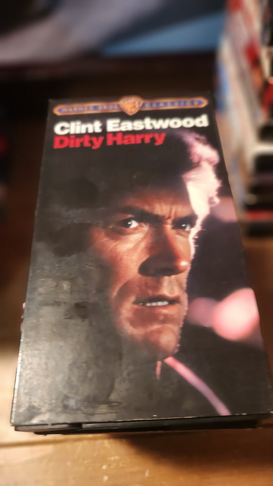 Lawrence's Collectibles Dirty Harry VHS for sale featuring Clint Eastwood close-up on vintage tape cover
