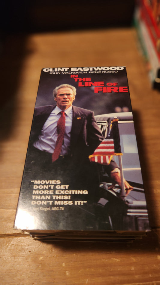 In The Line of Fire VHS tape featuring Clint Eastwood on cover from Lawrence's Collectibles
