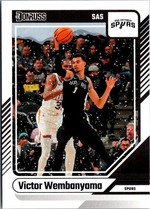 DONRUSS PANINI Victor Wembanyama trading card featuring action shot with player in Spurs uniform