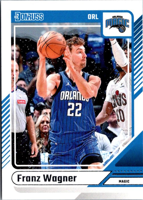 Franz Wagner basketball card featuring the player in Orlando Magic uniform with basketball in hand