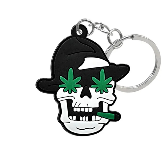 Gangsta skull collectible keychain featuring a skull with a hat and green details