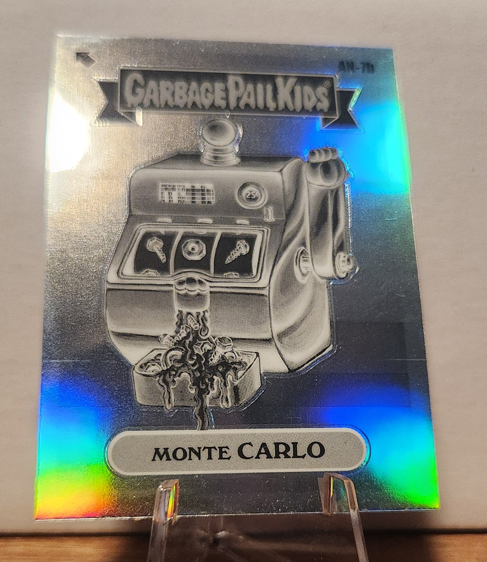 AN-7B Negative Refractor trading card featuring Monte Carlo from Garbage Pail Kids series