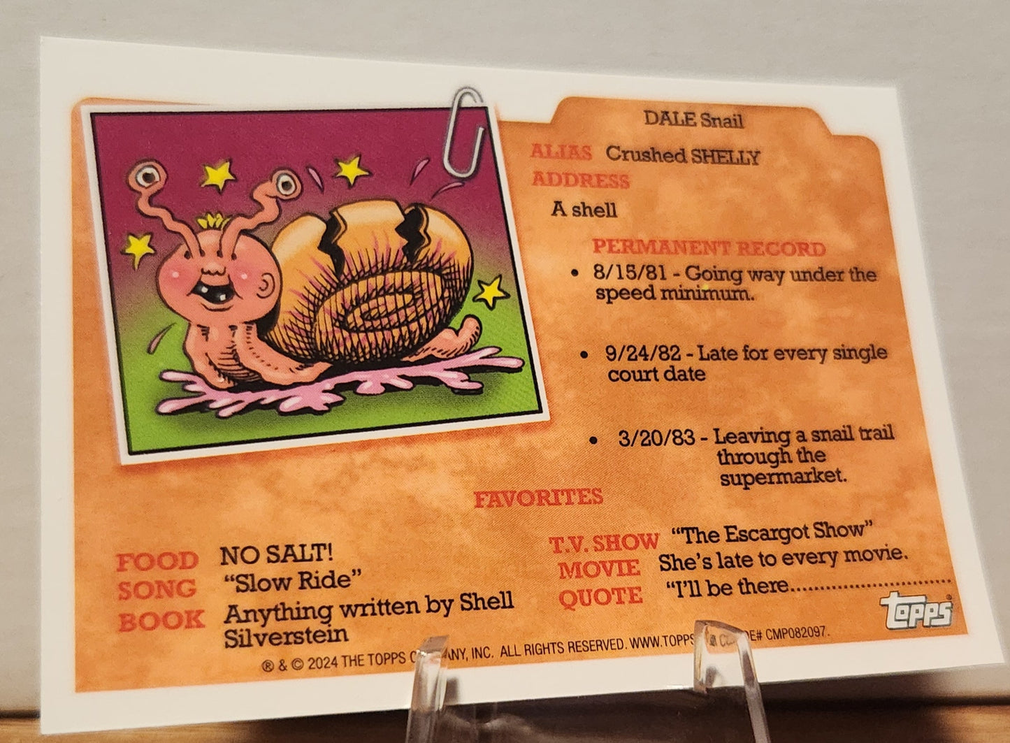 Garbage Pail Kids Braided Brandy card featuring Dale Snail with colorful artwork and fun personality traits
