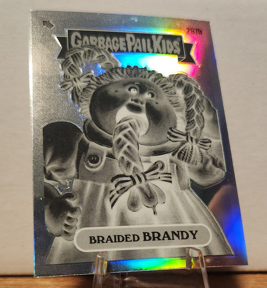 Garbage Pail Kids Braided Brandy card featuring a whimsical character with candy canes in a shiny finish