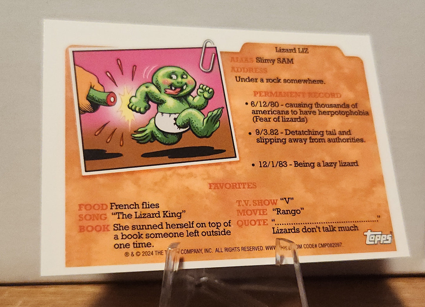 Garbage Pail Kids card AN-8B featuring Lizard Liz character with slimy details and funny backstory