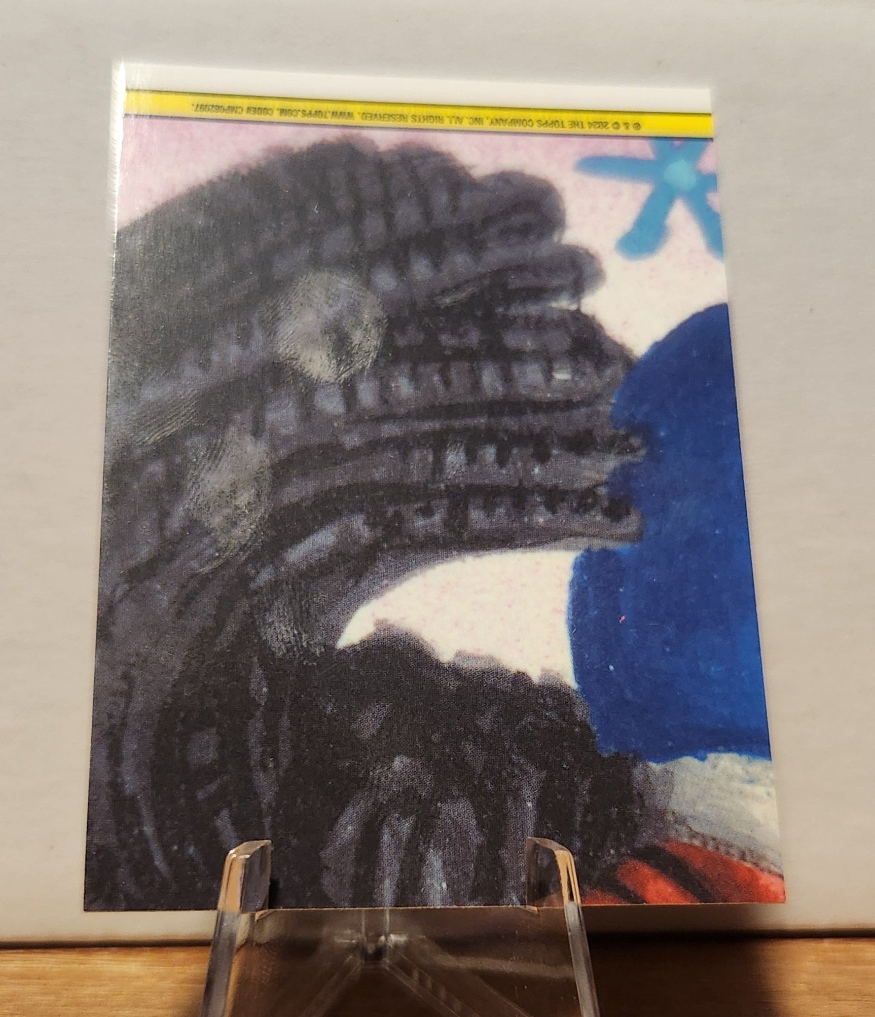 Curly Shirley refractor card by Topps featuring vibrant artwork and unique design details