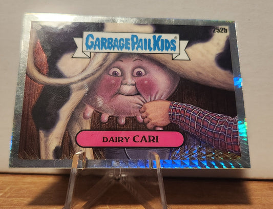 Dairy Cari Garbage Pail Kids card featuring a whimsical character with a playful design