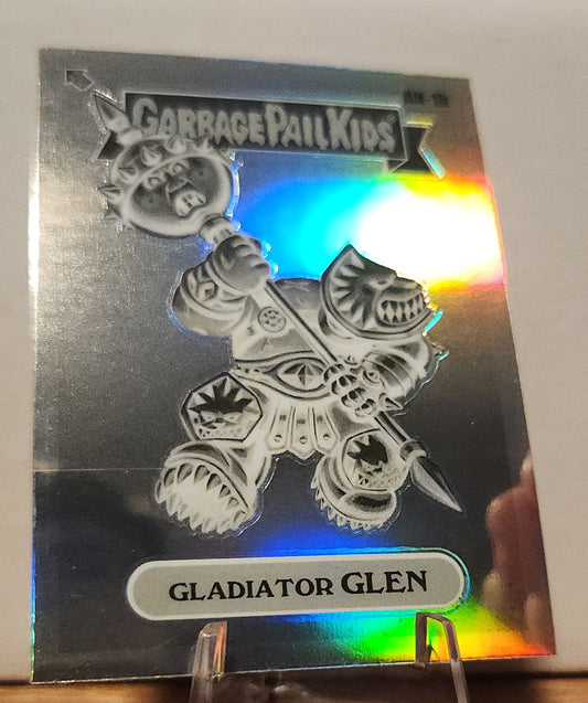 Gladiator Glen Garbage Pail Kids card with holographic finish, featuring a humorous warrior design.