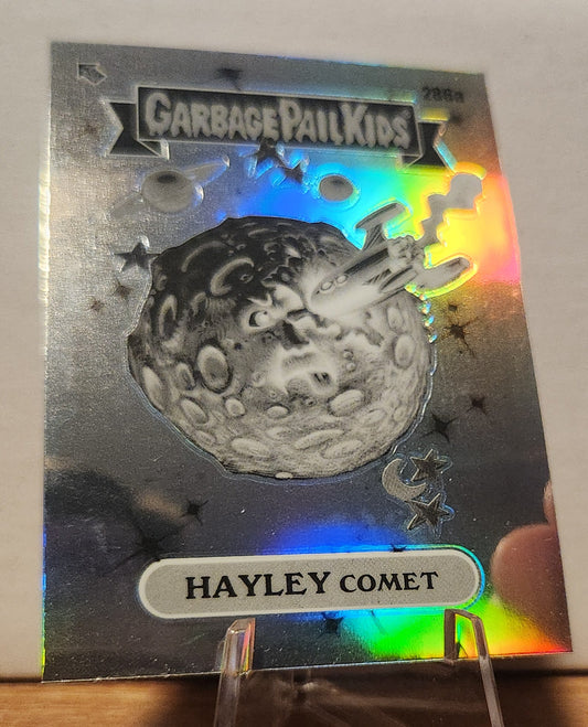 Garbage Pail Kids Hayley Comet card featuring a shiny design and colorful space theme