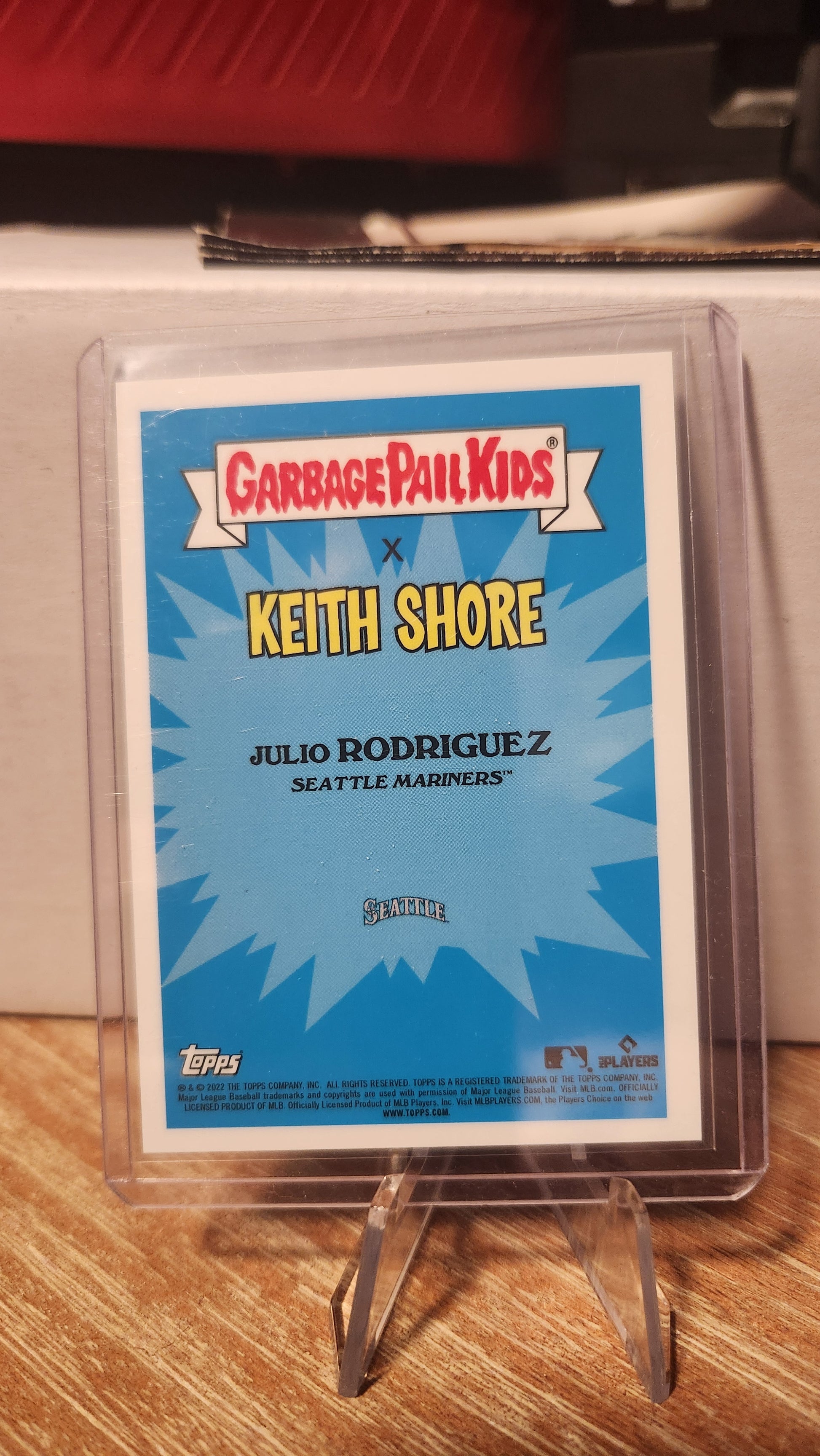 GPK Juli-Glow Rodriguez card featuring colorful artwork and a blue background by Topps