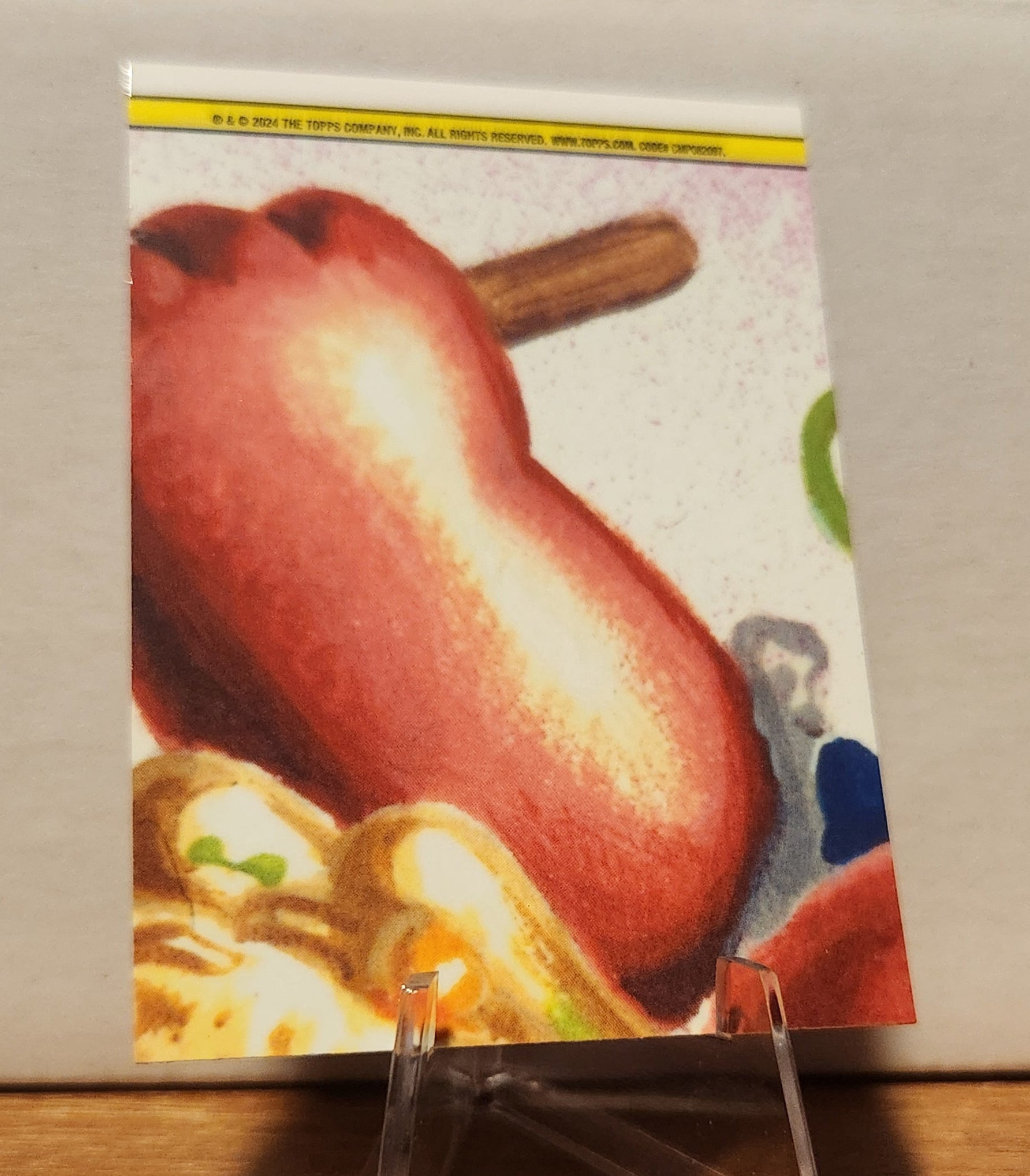Garbage Pail Kids magenta refractor trading card featuring a colorful illustration of food items