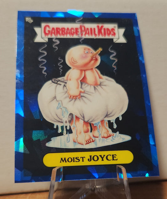 Garbage Pail Kids Moist Joyce collectible card featuring a baby in a diaper with a cigarette