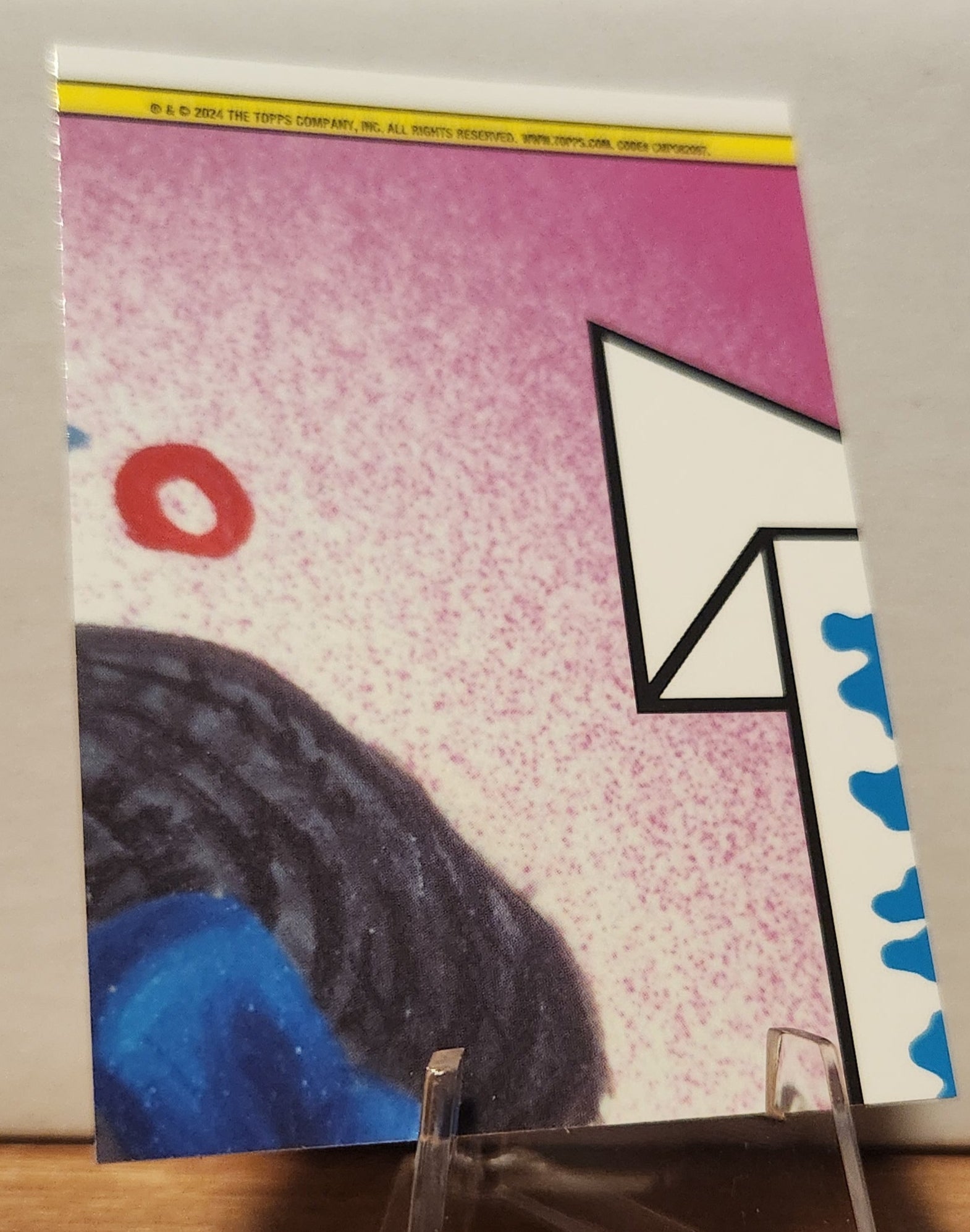 Garbage Pail Kids Prism Refractor card showcasing colorful artwork in unique design