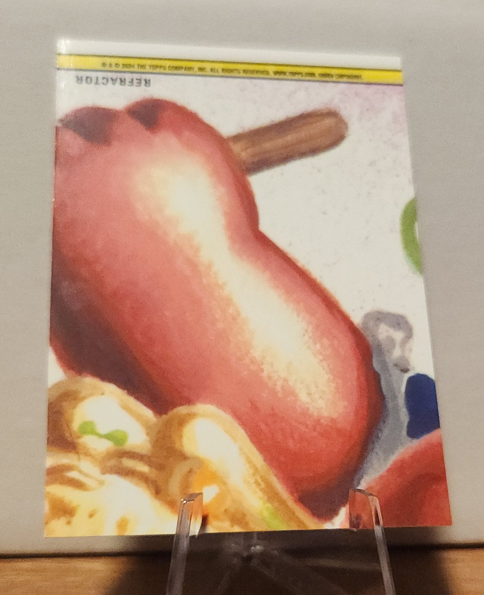 Garbage Pail Kids refractor card featuring colorful artwork and a humorous illustration