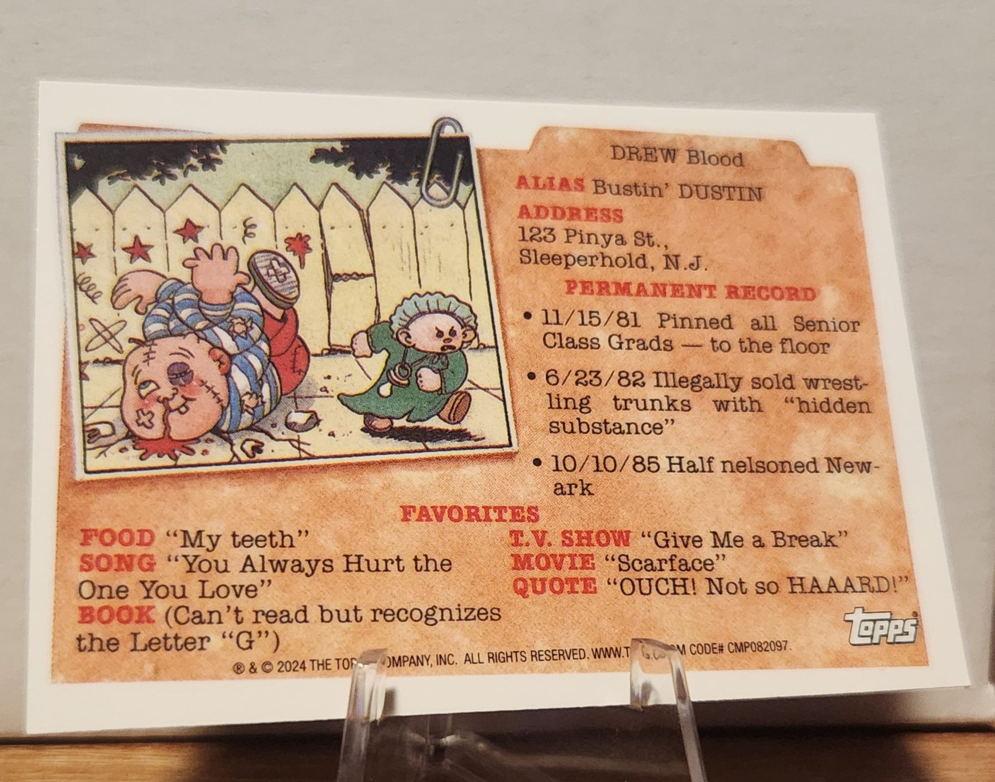 Reuben Cube trading card from Topps featuring Drew Blood character with quirky details and fun stats