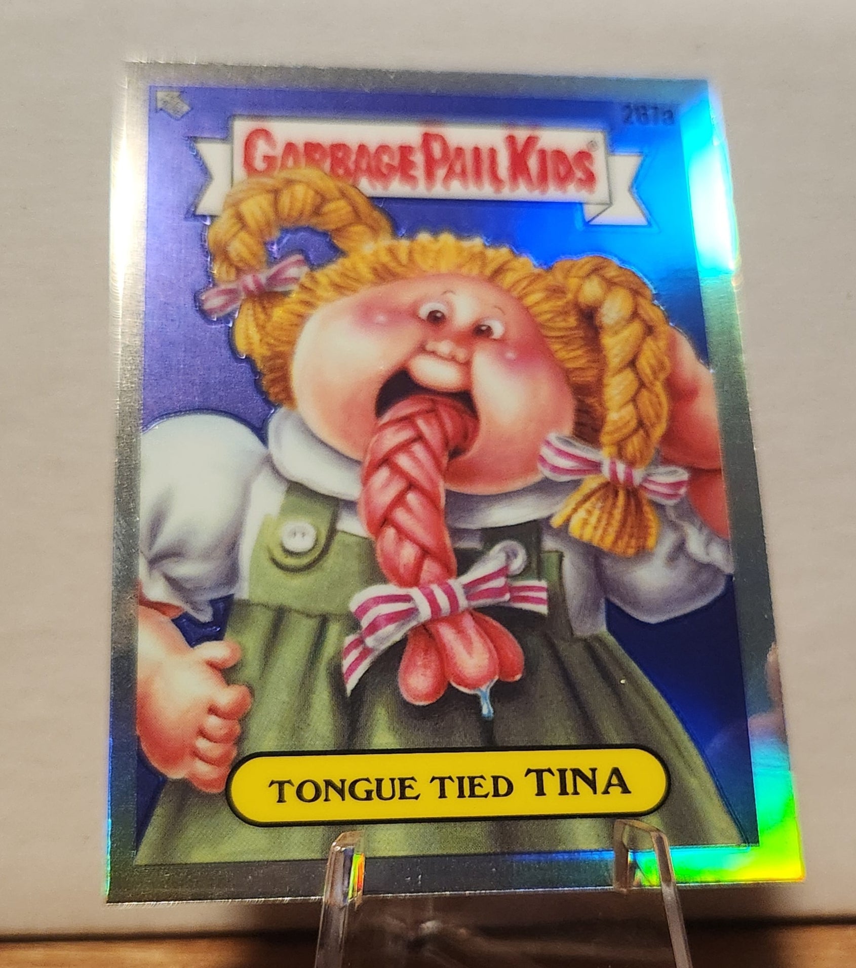 Garbage Pail Kids Tongue Tied Tina Refractor Card featuring a girl with a long tongue