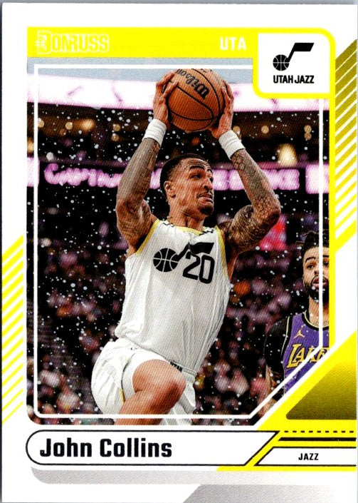 John Collins basketball card featuring him in action with the Utah Jazz against the Lakers