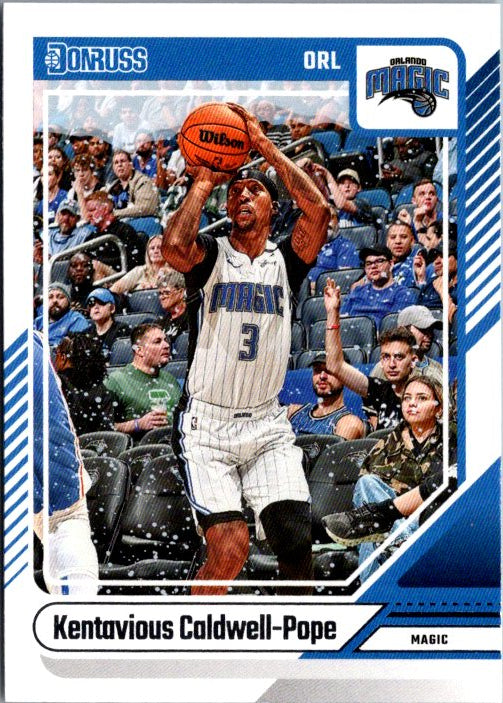 DONRUSS PANINI Kentavious Caldwell-Pope trading card featuring him shooting a basketball in an Orlando Magic jersey