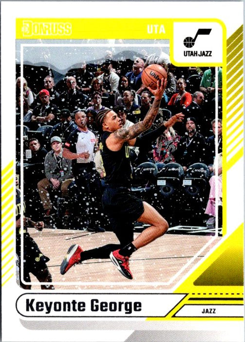 Keyonte George trading card featuring him shooting a basketball in a Utah Jazz uniform