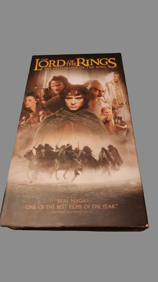 The Lord of the Rings VHS collectible featuring iconic characters and scenes from the movie