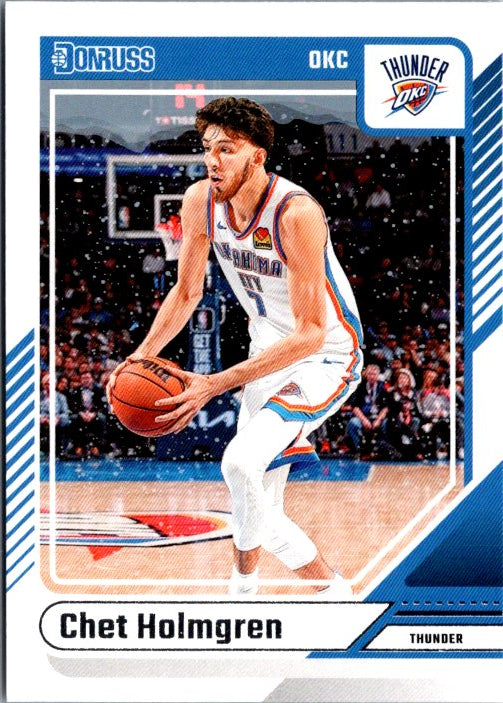Chet Holmgren rookie card featuring dynamic action shot in Oklahoma City Thunder uniform