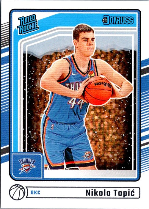 DONRUSS PANINI Nikola Topic rookie card in blue Thunder jersey with basketball pose