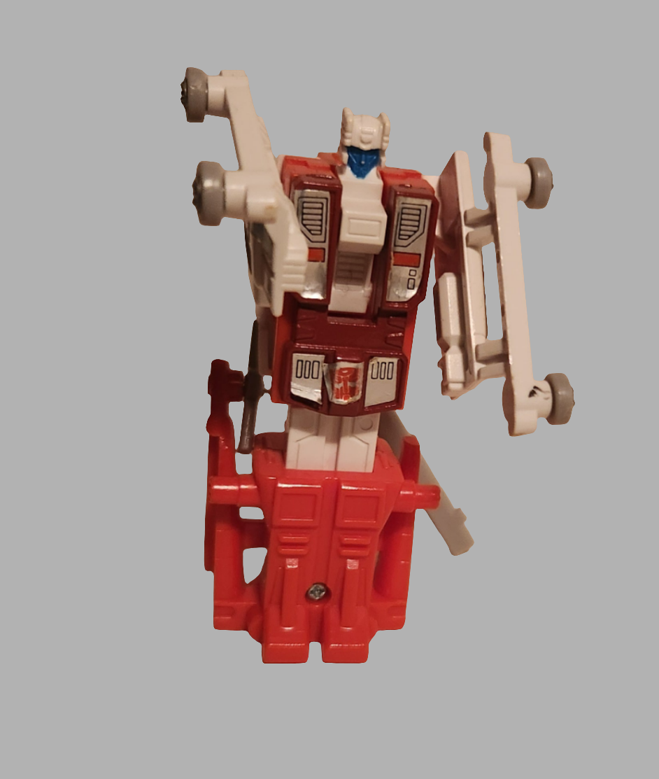 Transformers Protectobots parts figure standing in red and white colors with articulated arms and wheels