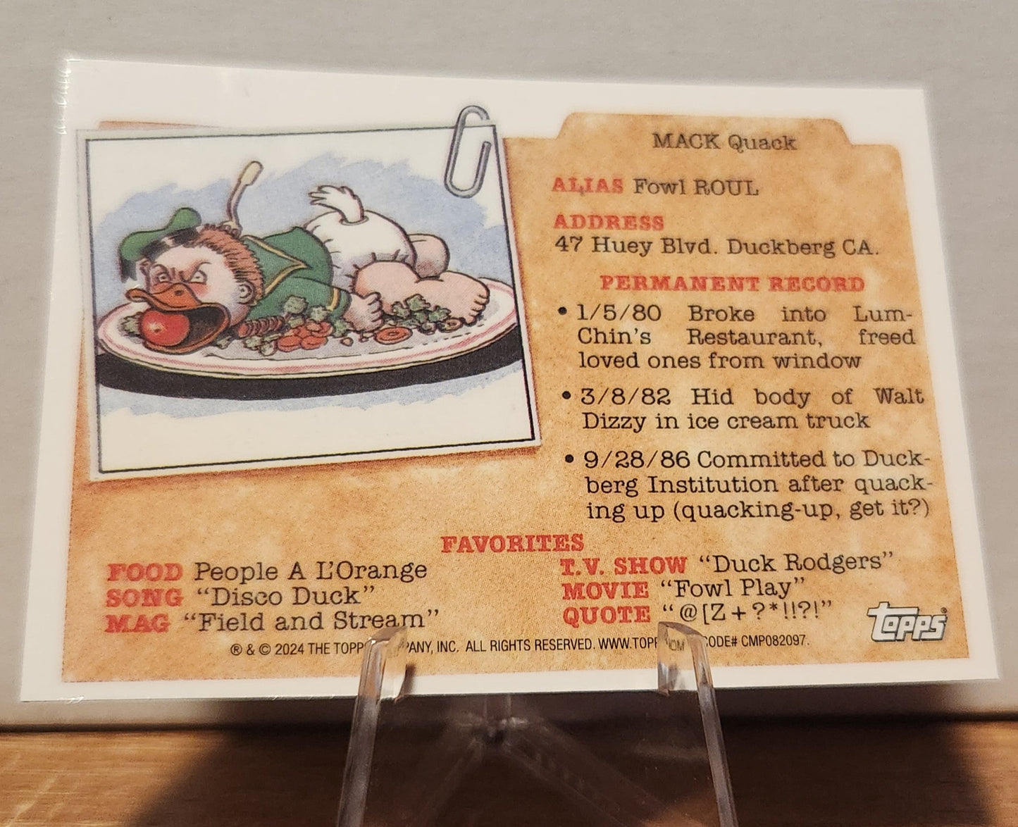 Purple Refractor Garbage Pail Kids trading card featuring Mack Quack with quirky character details