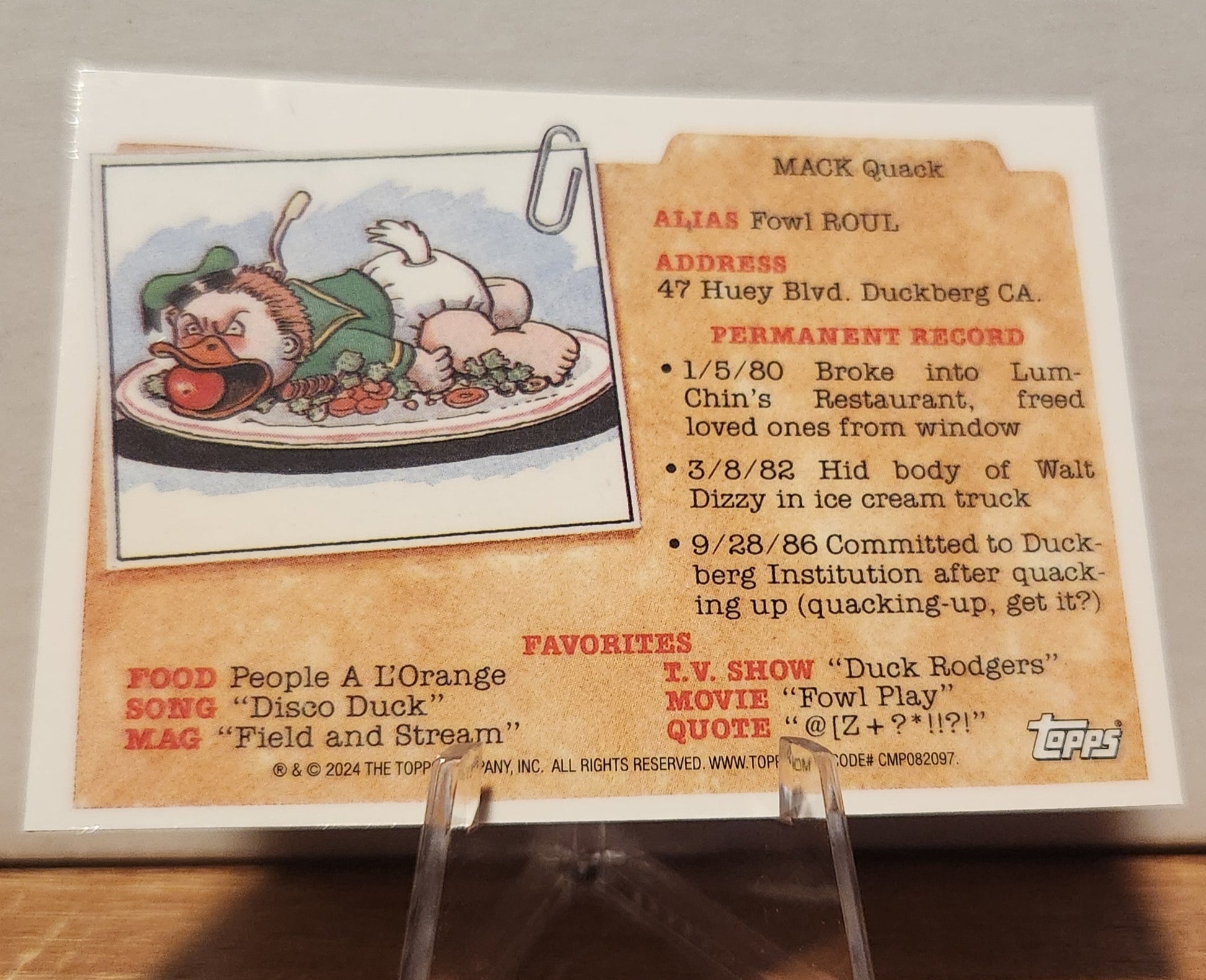 Purple Refractor Garbage Pail Kids trading card featuring Mack Quack with quirky character details