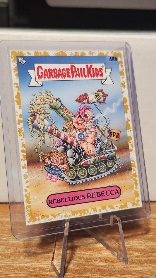 48B REBELLIOUS REBECCA - GOLD BORDER 7/50